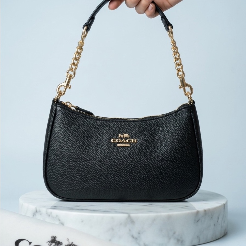 Coach Black Pebbled Leather Shoulder Bag with Gold Chain Accent